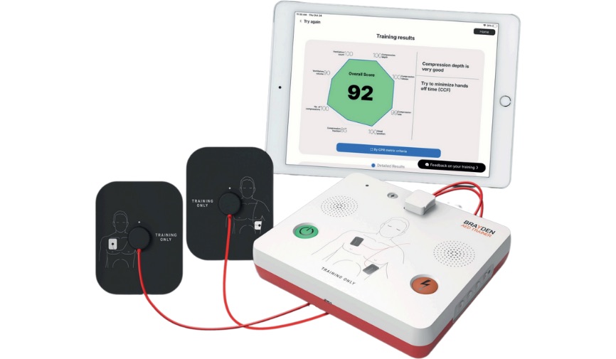 Brayden AED Trainer with pads and tablet screen for monitoring progress