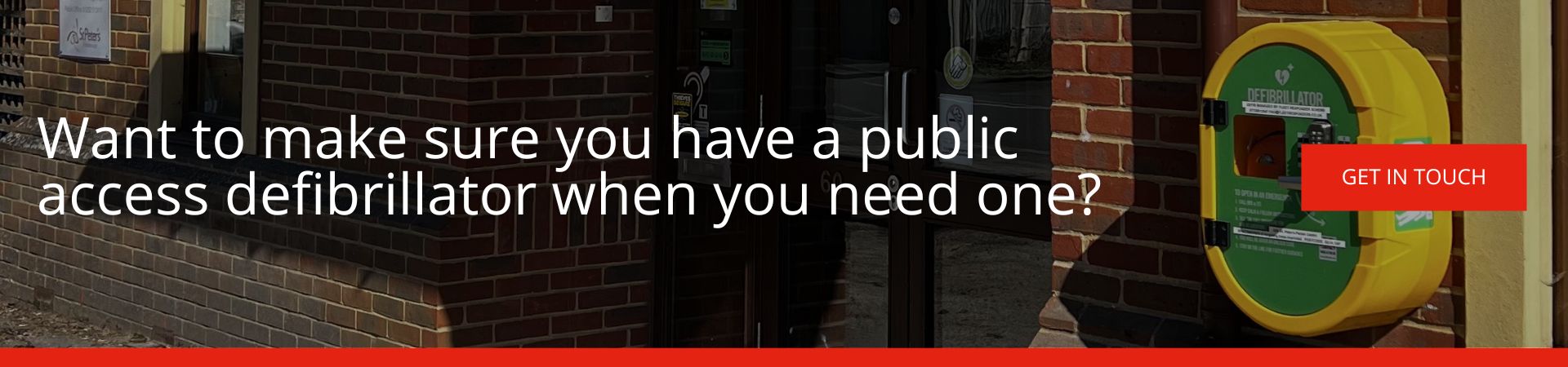Want to make sure you have a public access defibrillator when you need one: A banner advertisement showing a yellow and green wall-mounted defibrillator cabinet fixed to a brick wall outside a building, with a red "Get in Touch" button.